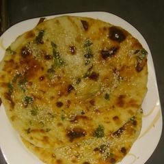 A picture of Rogni Garlic Naan.