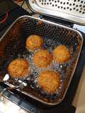Deep fried Italian meatballs stuffed with cheese curds