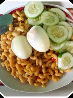 A picture of Palm oil macaroni jollof.