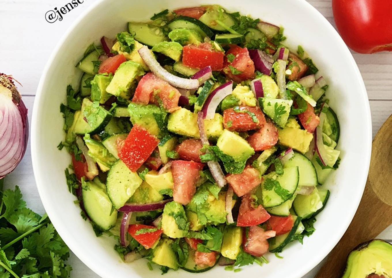 Tomato and cucumber salad with avocado
