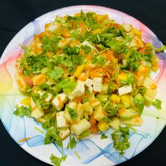 A picture of Paneer, carrot, raw mango salad.