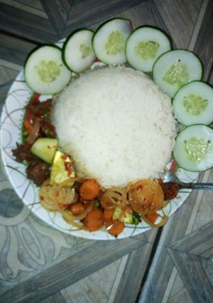 A picture of White rice and veggies.