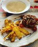 Sopa de cocido y timbal de filete de cerdo con cebolla caramelizada y pimientos asados