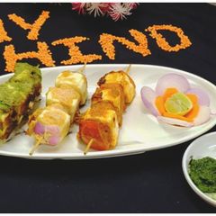 A picture of Tricolour Tandoori Paneer Tikka.