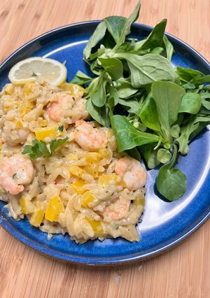 Une photo de Risotto d’orzo crevette et persil