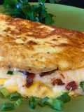 Omelette with Crispy Bacon, Vegetables and Mozzarella Cheese