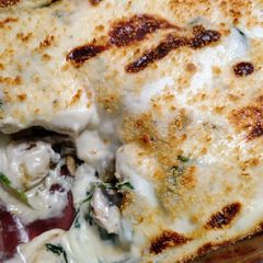 A picture of Gnocchi, mushroom, and blue cheese bake.