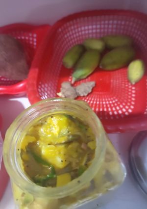 A picture of #cook pad india#seasonal achar Lime,green chilli,ginger pickle.