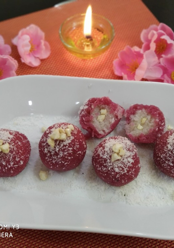 A picture of Coconut laddu in a different way (without artificial food colour.