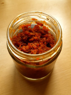 A picture of Tomato tangy (salsa / spread /pizza sauce).