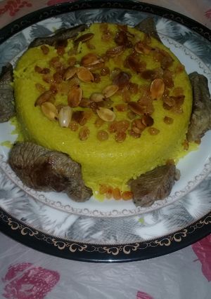 صورة لوصفة أرز بالمكسرات مع اللحمة 🌸🌸