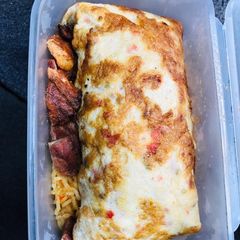 A picture of Title: noodles wrapped in omellette.
