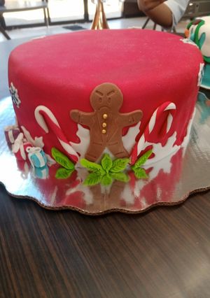 Una foto de Pastel navideño decorado con fondant
