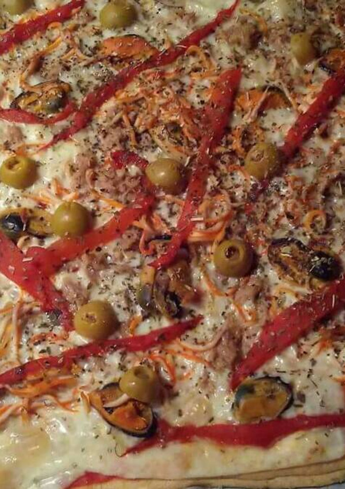 Una foto de Pizza marinera con base de tofu