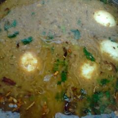 A picture of Sabut mung ki dal with boil eggs.