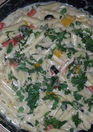 A picture of Spinach mintveg pasta with cheese.