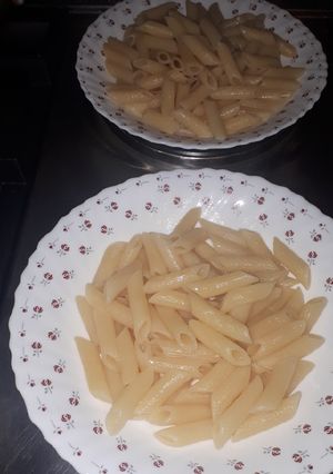 A picture of Boiled penne pasta.