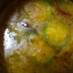 A picture of Ridged gourd red lentil daal.