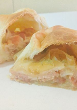 Una foto de Empanaditas de panceta y cebolla