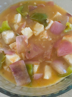 A picture of Paneer in white chili sauce.