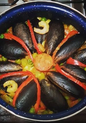 Una foto de Paella