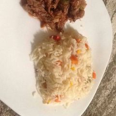 A picture of Rice served with Beef.