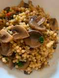 Fregula cun cordolinu (Fregola con i funghi)