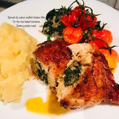 A picture of Kale and Walnut Stuffed Chicken.