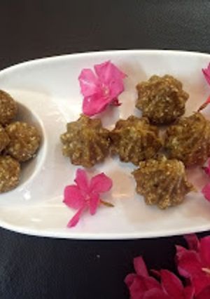 A picture of Dry Fruits Ladoo and Modak.