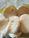 Patatas al horno con crema y queso