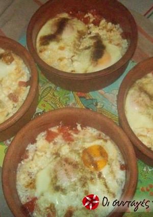 Φωτογραφία της συνταγής Αυγά μάτια με ντομάτα στο πήλινο
