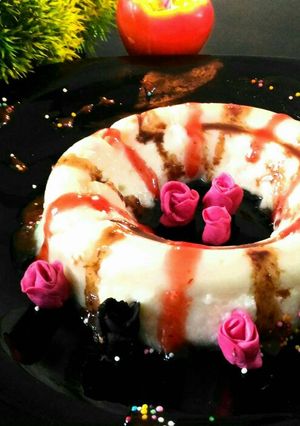 A picture of Potato pudding topping with white chocolate.