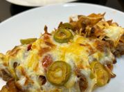 Una foto de picada queso rallado