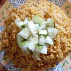 A picture of Palm oil concortion rice.