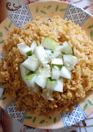 A picture of Palm oil concortion rice.