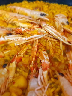 Una foto de Arroz con Sepia y Cigalas