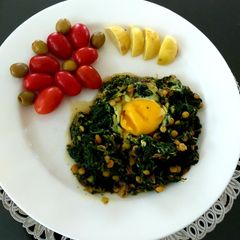 A picture of Spinach and split peas with egg(tareh esfenaj)تره اسفناج.
