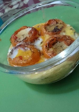 A picture of Baked Tomatoes and Eggs.