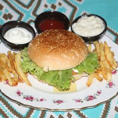A picture of Chicken Pattie burgers with fries and coleslaw 🤩 🤩.