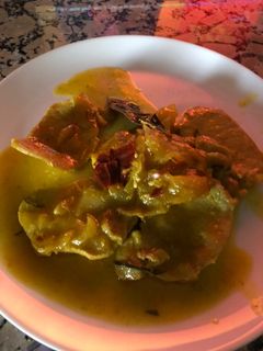 Una foto de Cinta de lomo en salsa
