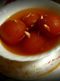 অরেঞ্জ ফ্লেভারড রাঙা আলুর গুলাবজামুন (Orange flavored ranga aloor Gulab jamun recipe in Bengali) রেসিপির প্রধান ছবি