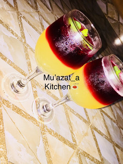 A picture of Pineapple nd Hibiscus mocktail.