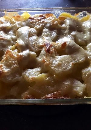 Una foto de Papas con pollo y crema de leche