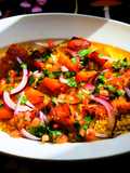 Ensalada templada de cuscús, calabaza tandoori y granada