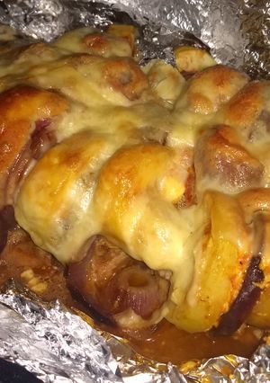 Una foto de Bondiola rellena envuelta en aluminio