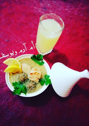 A picture of White Vermicelli Soup (Eastern Algerian Style) with Meatballs.