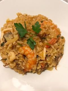 Una foto de Arroz caldoso de mariscos