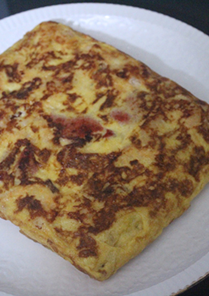 Una foto de Tortilla cuadrada de pimientos y patatas