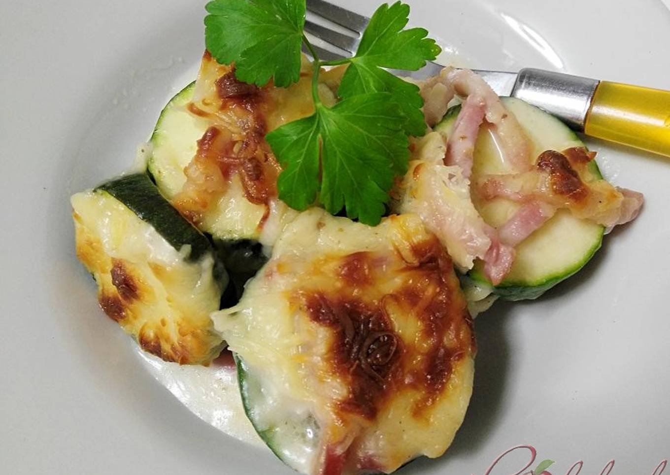 Gratén de calabacín y crema de queso manchego