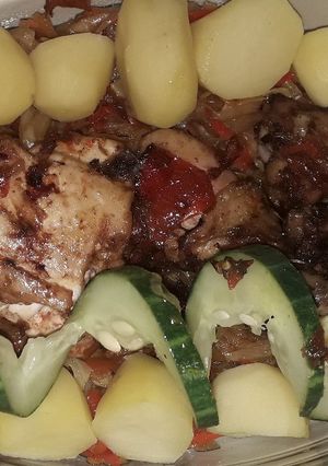 A picture of Grilled chicken nd boiled potato with veggies.